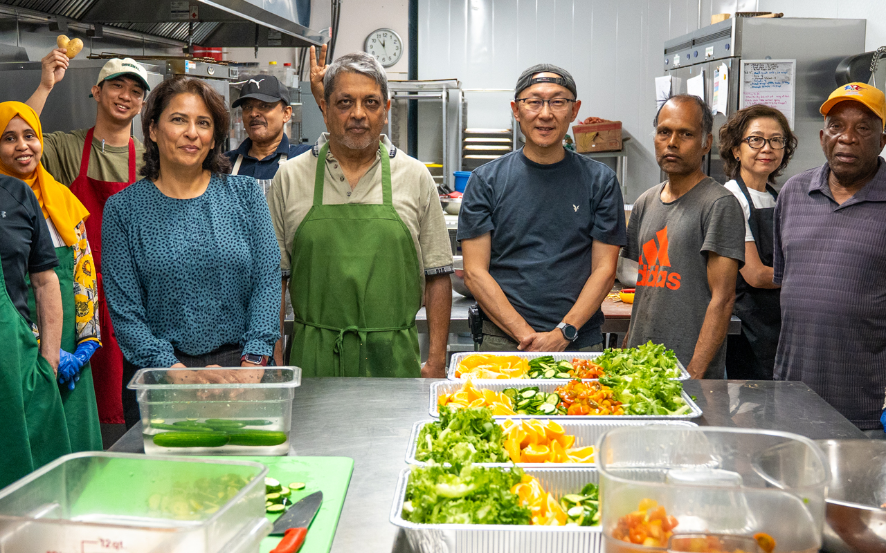 5N2 community members preparing food together